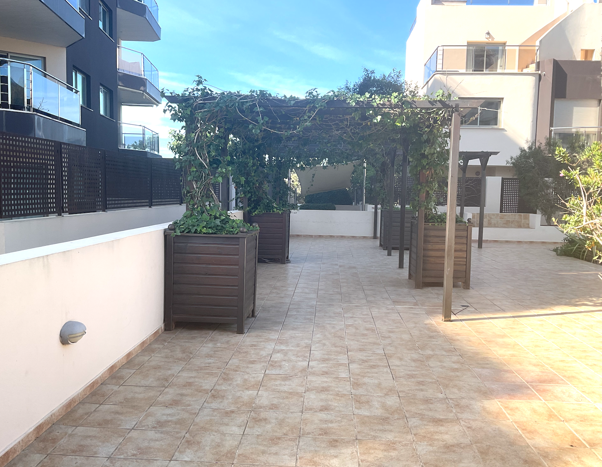 Resa Estates Ibiza for sale te koop santa Eularia beach apartment garden.png